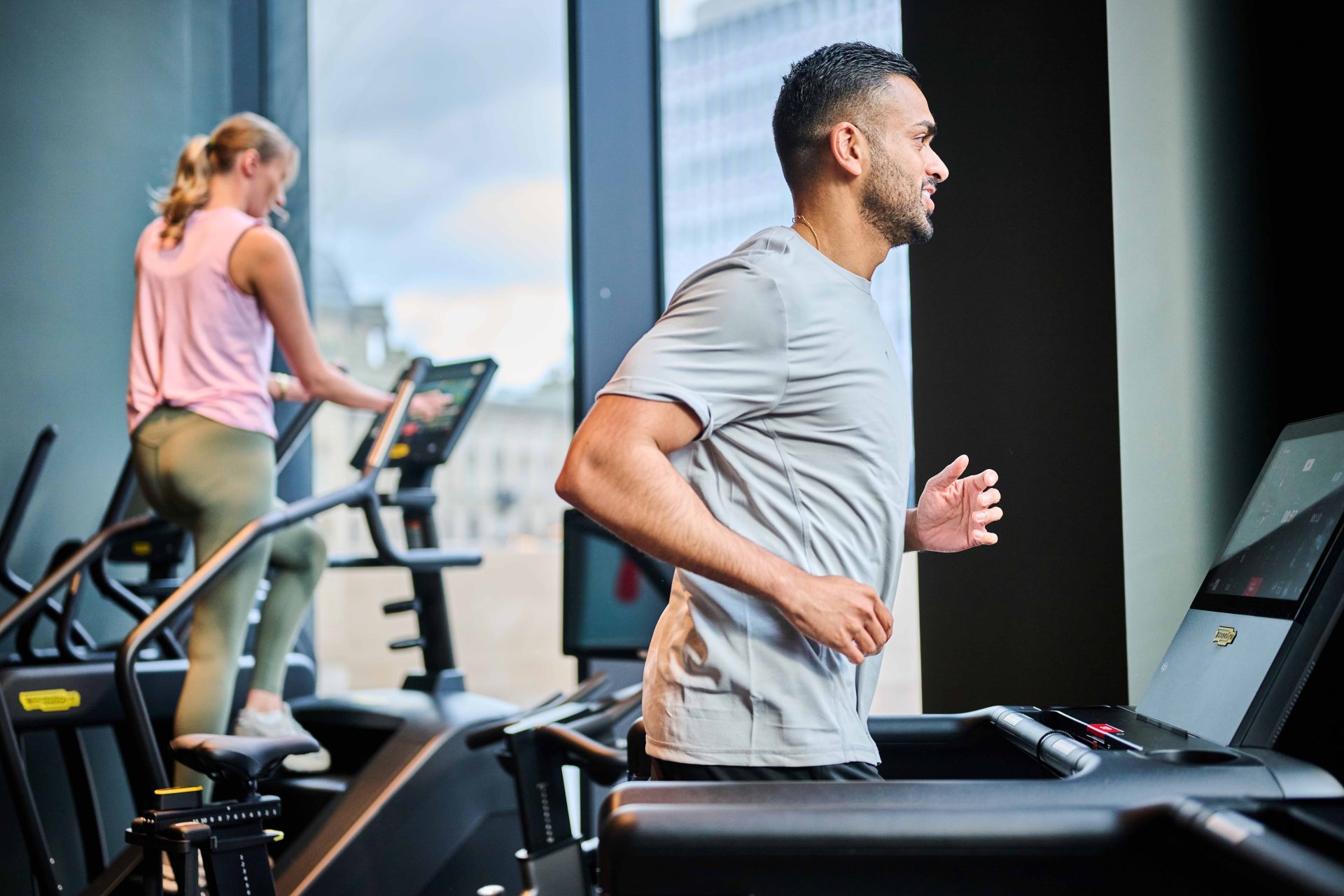 Residents using the gym in The Octagon luxury residential apartments with premium amenities for tenants